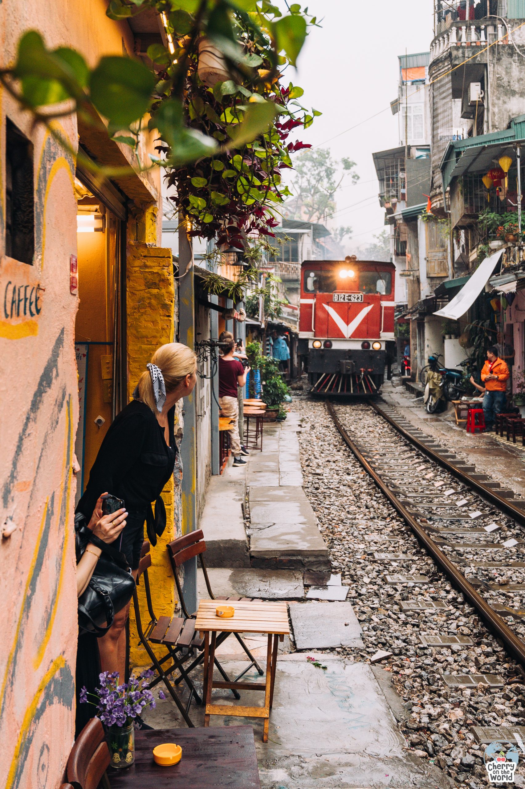 train passing by in the Train Street Hanoi