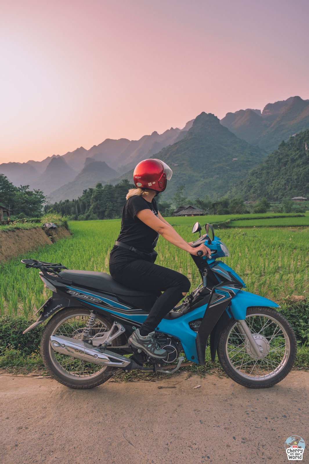 girl on a motorbike at the sunset ha giang